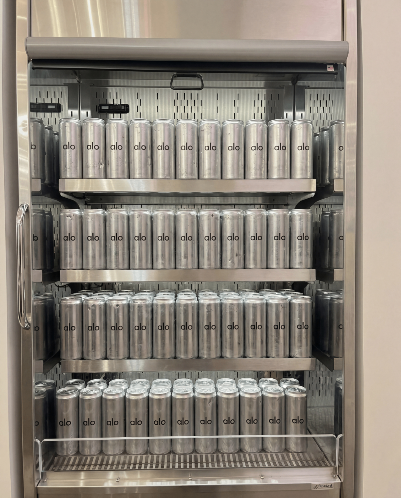 Fridge stocked with alo aluminium cans