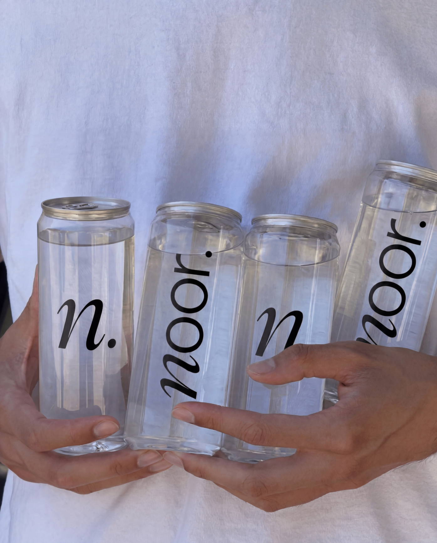 Clear aluminium cans with noor branding